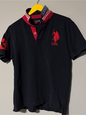 U.S. Polo Assn. black polo shirt Size L youth S women’s